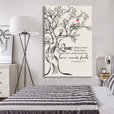Inspirational wall art canvas showcasing 1 Corinthians 13:7-8, "Love Never Fails," and personalized initials carved in a tree.