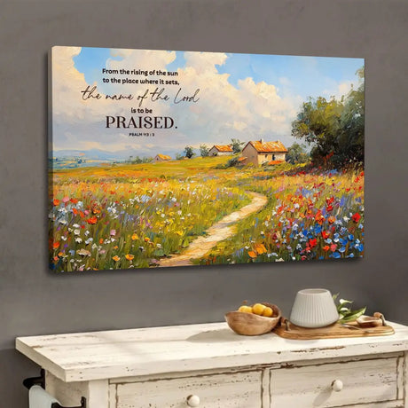 Christian wall art with Psalm 113:3 "From the Rising of the Sun," countryside and colorful wildflowers, Bible verse decor.