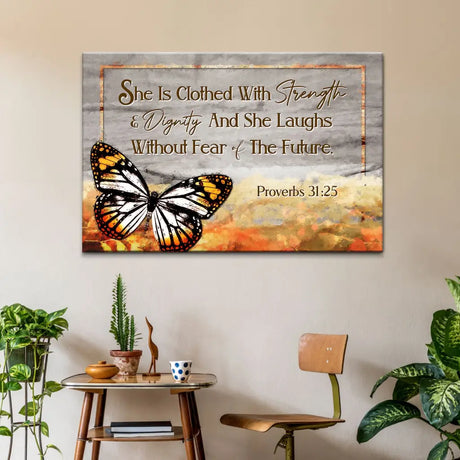 Bible verse wall art canvas featuring Proverbs 31:25, "She is clothed with strength and dignity," with butterfly art in brown, perfect Christian decor.