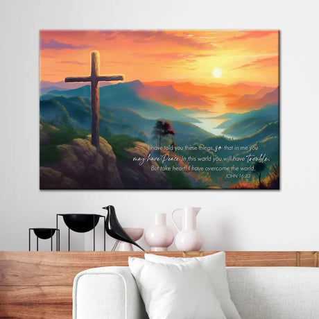 Inspirational wall art featuring John 16:33, "Take heart," paired with a sunset and cross design for faith-filled decor.