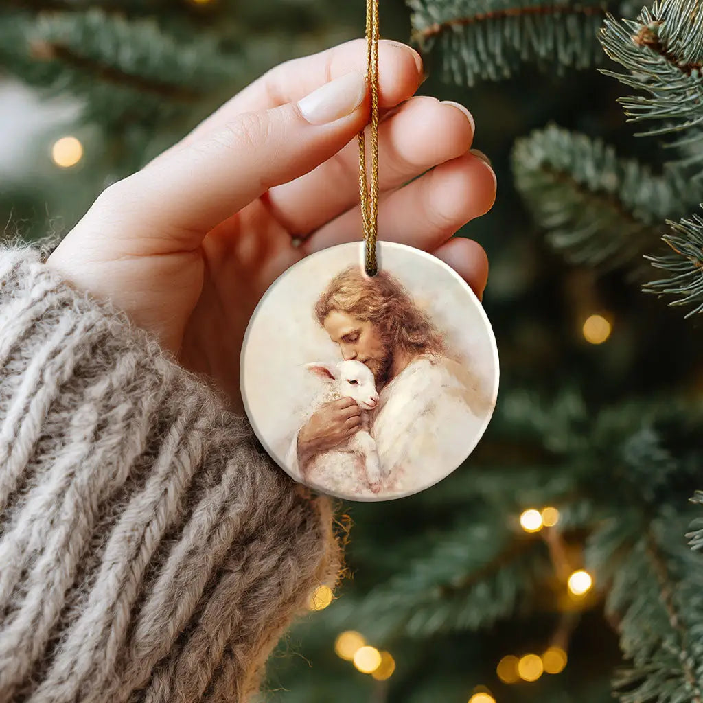Christian Christmas ornament of Jesus the Good Shepherd with lamb, perfect reminder of His protection.