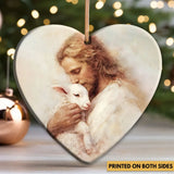 Jesus carrying a lamb ornament, representing divine compassion and the safety found in God’s arms.