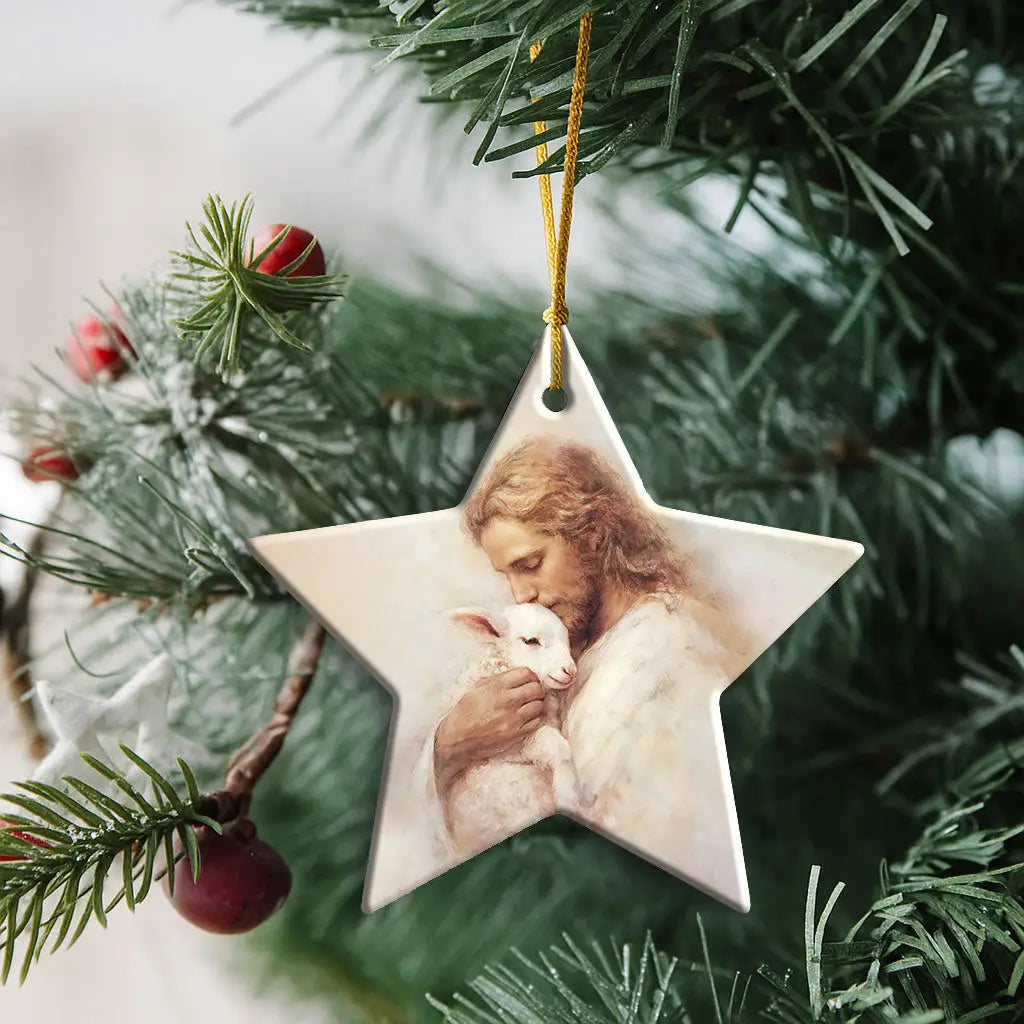 The Good Shepherd ornament depicting Jesus with lamb, timeless reminder of God’s gentle protection.