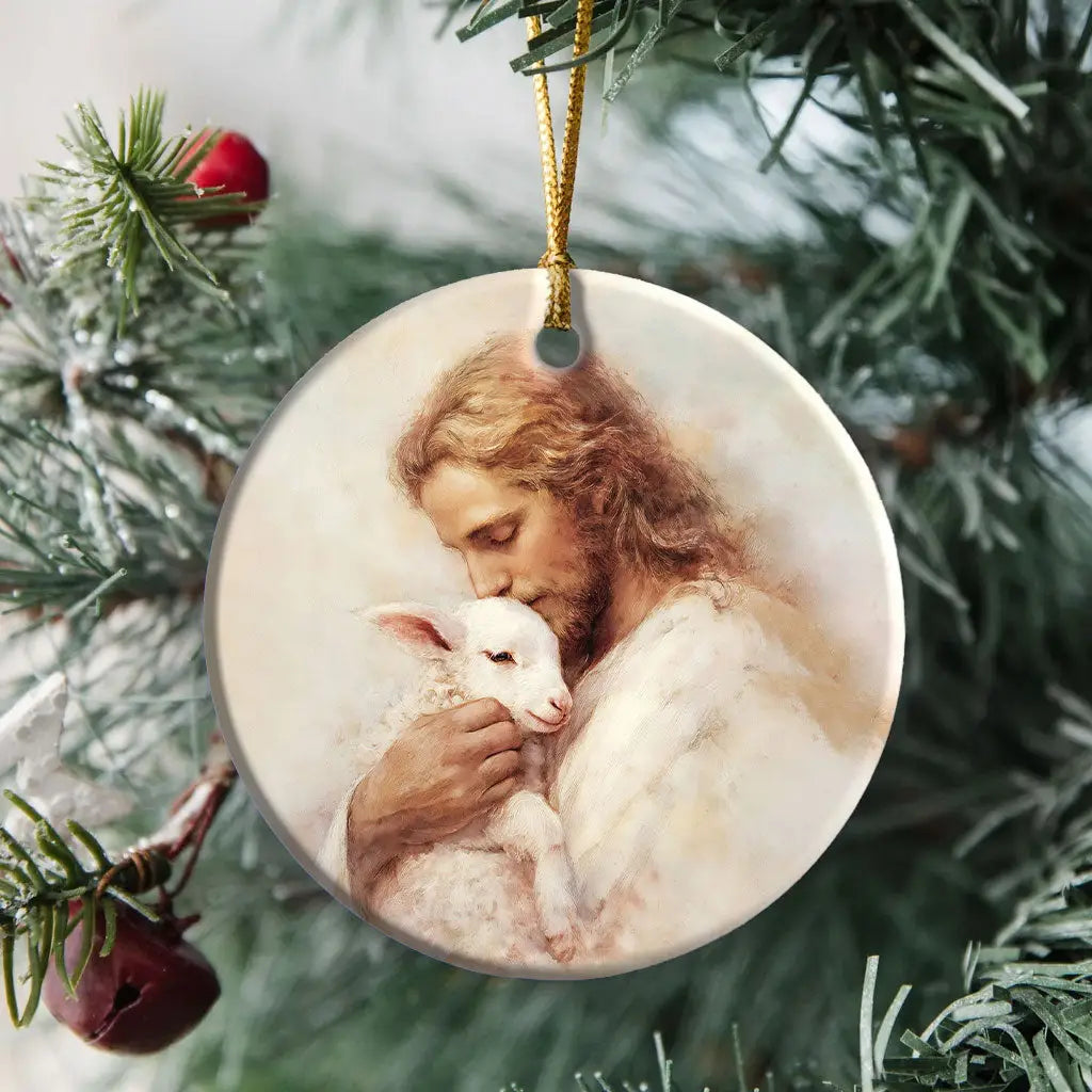The Good Shepherd ornament featuring Jesus gently holding a lamb, symbol of care and divine love. Circle / 1-pack