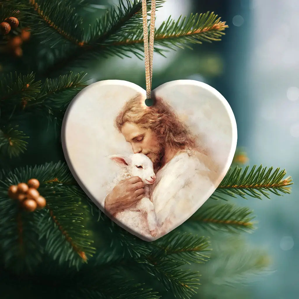Meaningful Christian ornament capturing the tenderness of Jesus holding a lamb close to His heart. Heart / 1-pack