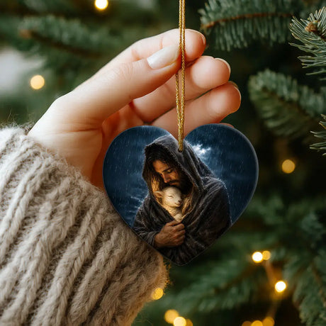Good Shepherd Christian ornament with Jesus holding lamb under rain and stormy sky