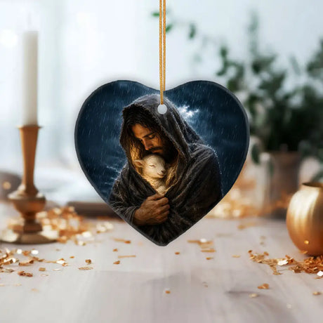 Jesus shelters a lamb in the rain Christian ornament inspired by Luke 15 Good Shepherd