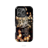 The light shines in the darkness John 1:5 Bible verse phone case Christian gifts iPhone 16 Pro / Tough Case