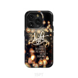 The light shines in darkness John 1:5 Bible verse phone case Christian gifts iPhone 15 Pro / Tough