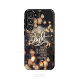 The light shines in darkness John 1:5 Bible verse phone case Christian gifts Samsung Galaxy S23 Plus / Tough