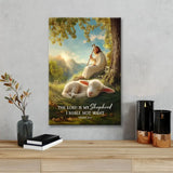 The Lord Is My Shepherd Psalm 23:1 wall art canvas featuring Jesus holding a lamb.