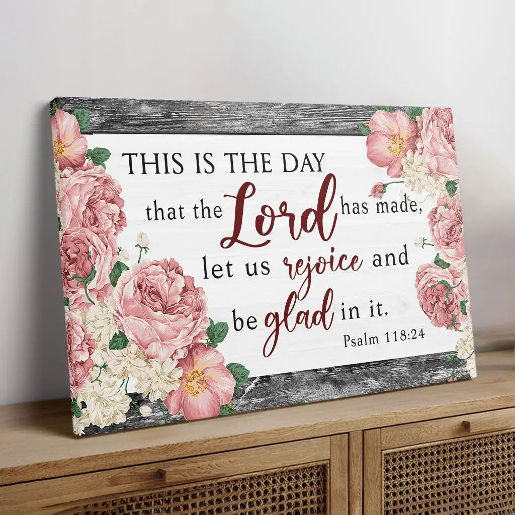 Inspirational Bible verse canvas, Psalm 118:24, floral border on grey wood, "This is the day," perfect Christian gift.