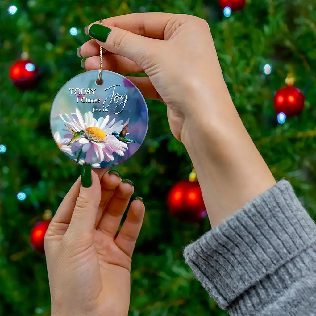 Faith-based ornament with hummingbird and daisies symbolizing joy, renewal, and God’s grace.