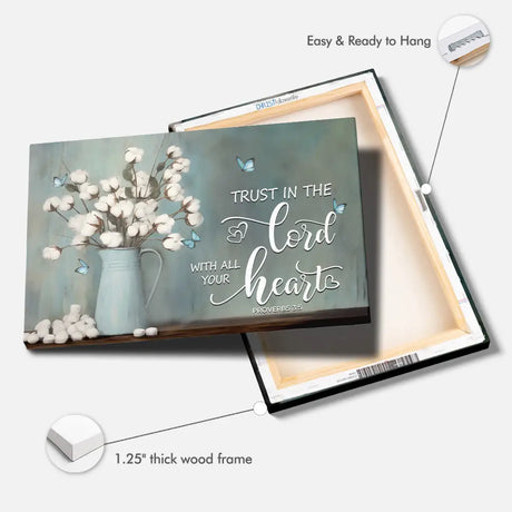 Scripture wall art featuring Proverbs 3:5: "Trust in the Lord with all your heart," with cotton flowers in a vase.