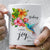 White coffee mug featuring colorful hibiscus flowers and a hummingbird with the text ’Today I choose joy’ and ’James 1:2’’.