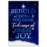 Faith-based Christmas canvas wall art displaying "Behold I Bring You Good Tidings Of Great Joy" with a starry sky, great religious holiday decor.