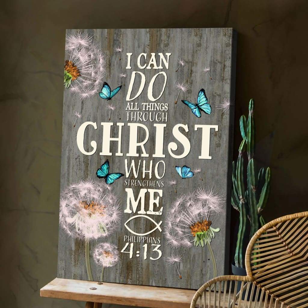 Bible verse wall art canvas with "I Can Do All Things Through Christ" and dandelion butterfly on gray wooden background.