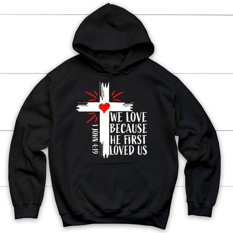 Christian hoodie: 1 John 4:19 We love because he first loved us hoodie Black / S