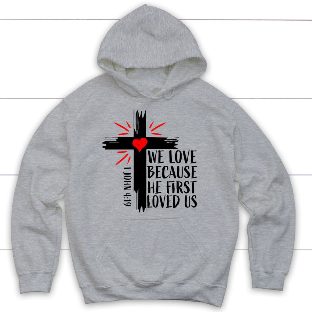 Christian hoodie: 1 John 4:19 We love because he first loved us hoodie Sport Grey / S
