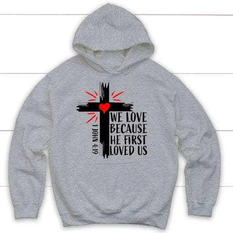 Christian hoodie: 1 John 4:19 We love because he first loved us hoodie Sport Grey / S