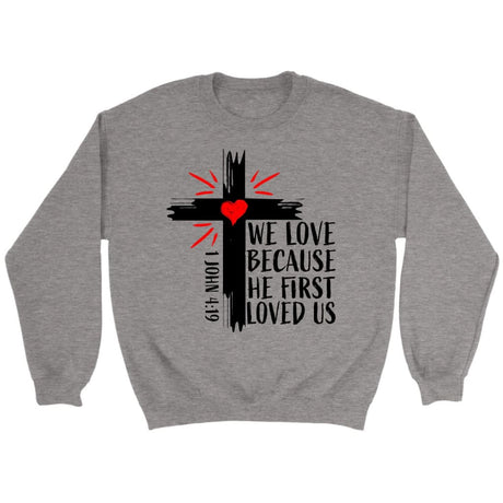 Christian sweatshirts: 1 John 4:19 We love because He first loved us sweatshirt Sport Grey / S