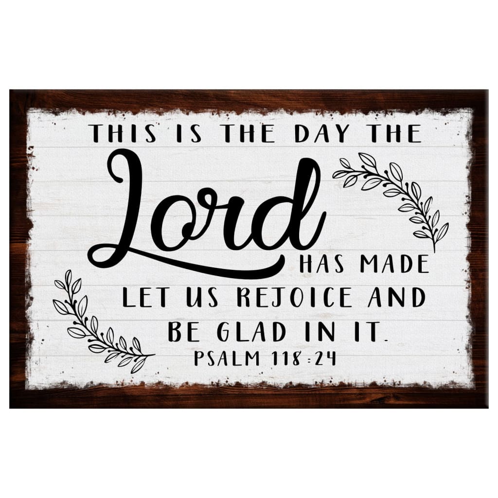 Inspirational Bible verse wall art, "This Is The Day The Lord Has Made" with rustic border on white canvas.