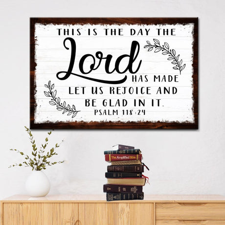 "This Is The Day The Lord Has Made" Bible verse wall art canvas with rustic border, white background.
