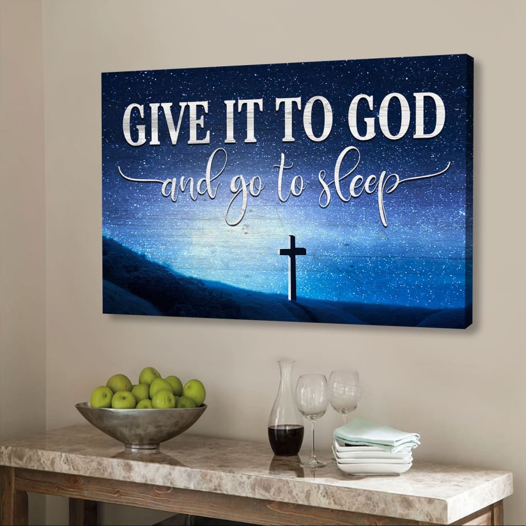 "Give it to God and go to sleep" Christian wall art with wooden cross under starry sky, ideal for bedroom decor.