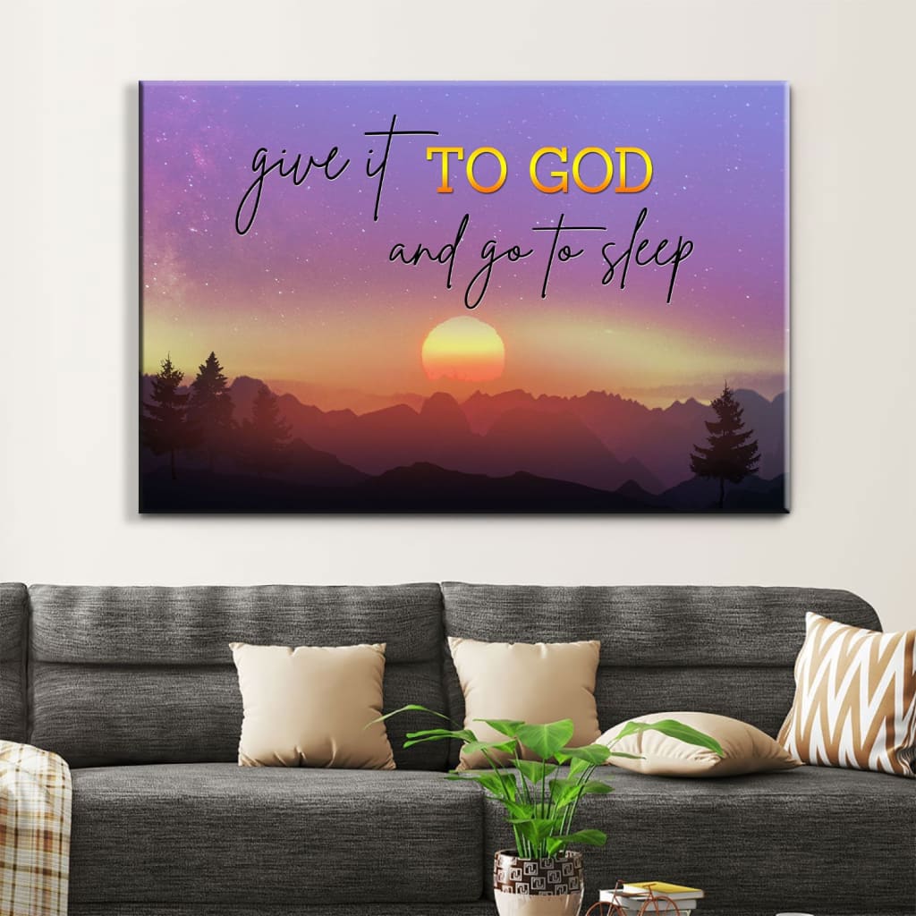 Christian wall art featuring "Give it to God and go to sleep" with a mountain sunset scene.
