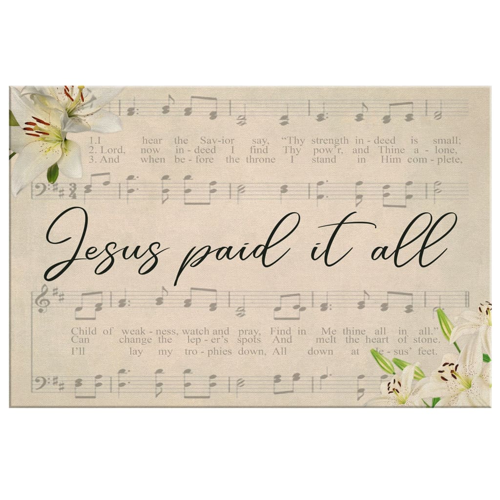 Christian wall decor with "Jesus Paid It All," sheet music, and lilies, great for faith-filled inspiration.