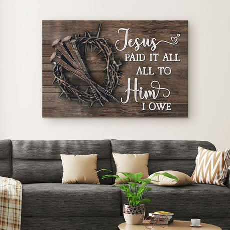 Easter wall art with "Jesus Paid It All" and 3 nails, crown of thorns on wood background, ideal Christian gift.