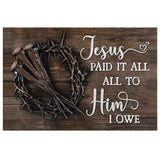 Jesus wall art canvas with "Jesus Paid It All" and a wooden background, featuring nails and crown of thorns.