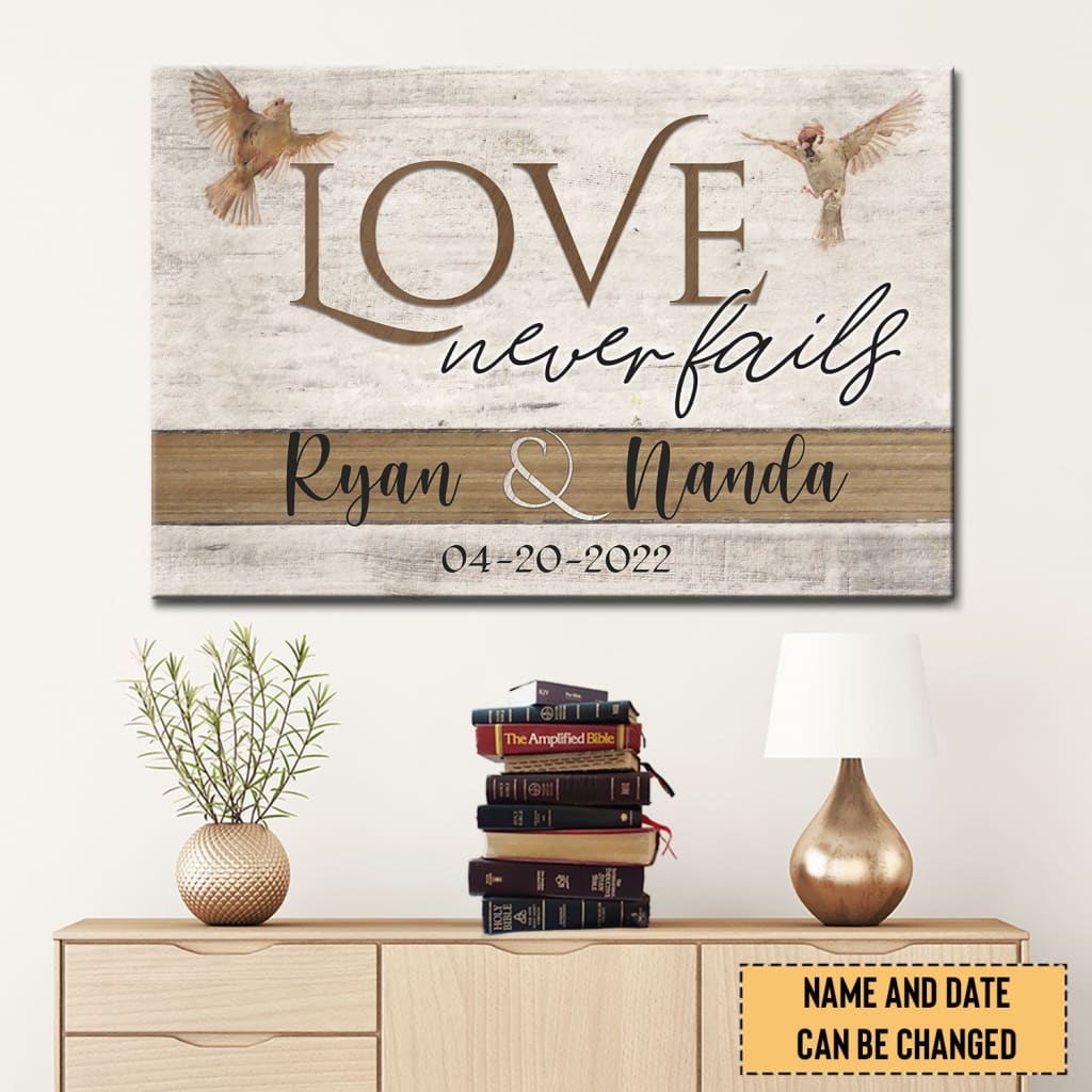 Personalized &quot;Love Never Fails&quot; wall art canvas with custom names and date, featuring a sparrow couple, Christian gifts.