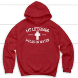 Inspirational Christian hoodie with "My Lifeguard Walks On Water" message, great for scripture-based gifts. Red