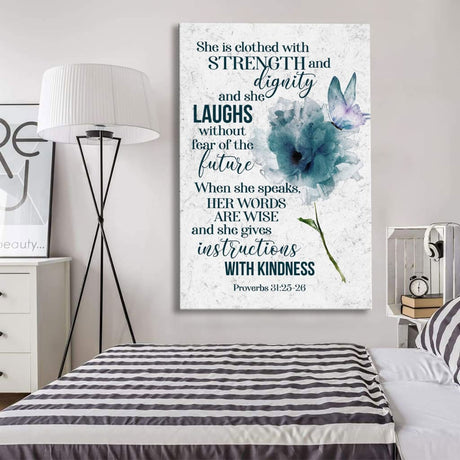 Christian art wall canvas displaying the empowering verse from Proverbs 31:25-26, "She Is Clothed With Strength And Dignity," perfect for home decor.