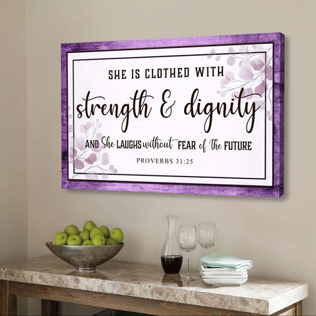 Christian wall art canvas featuring "She is clothed with strength & dignity," Proverbs 31:25, with rustic Purple wooden border.