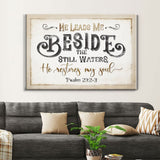 Rustic farmhouse Christian wall art: Psalm 23:2-3 "He Leads Me Beside The Still Waters," inspirational Bible verse decor.
