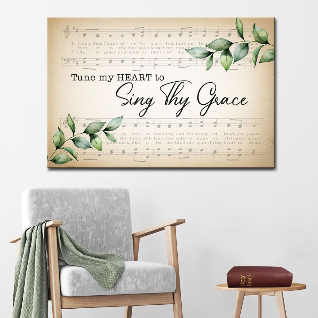 "Tune My Heart to Sing Thy Grace" Christian wall art canvas featuring sheet music and green leaves, perfect for home decor.