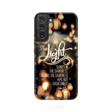 The light shines in darkness John 1:5 Bible verse phone case Christian gifts Samsung Galaxy S22 Plus / Tough